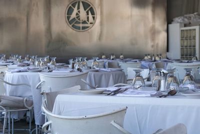 Tables and chairs in restaurant