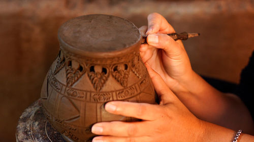 Close-up of woman holding hands