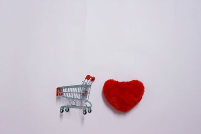 Close-up of heart shape over white background