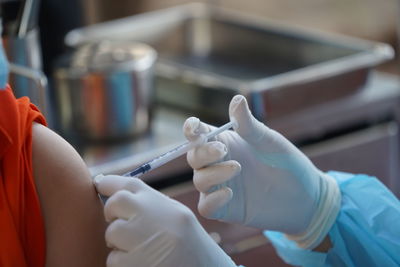 Vaccination on the patient's shoulder, vaccination and prevention of influenza or viral outbreaks