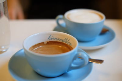 Close-up of coffee cup on table