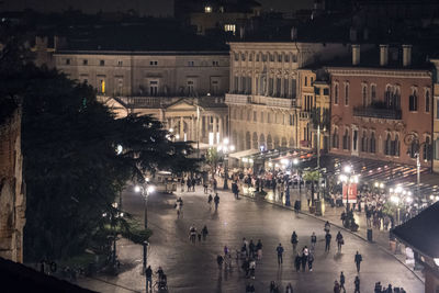 High angle view of people on street at night