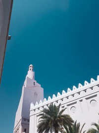 Low angle view of building against blue sky