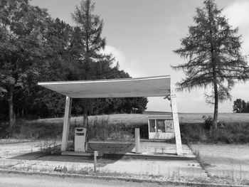 Empty table in park against sky