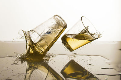 Close-up of drink against white background