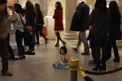 Low section of people walking in corridor