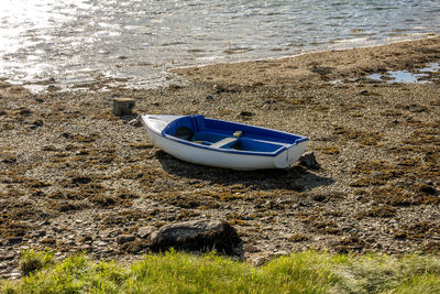 High angle view of boats moored on shore