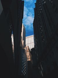 Low angle view of skyscrapers against sky
