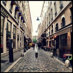 Narrow alley with buildings in background