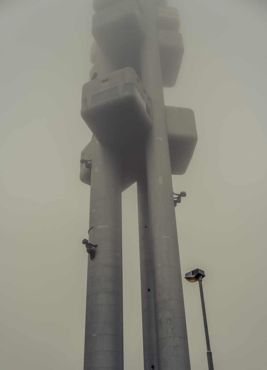 LOW ANGLE VIEW OF COMMUNICATION TOWER AGAINST SKY