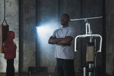 Rear view of man working in gym