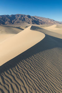 Scenic view of desert against sky