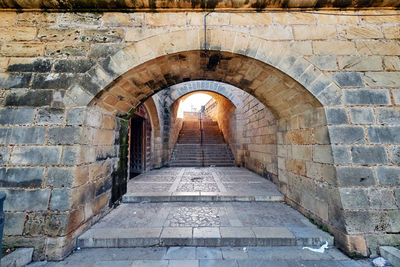 Archway of old stone wall