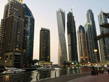 Modern buildings in city against sky