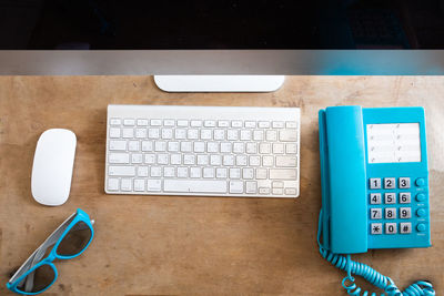 High angle view of mobile phone on table