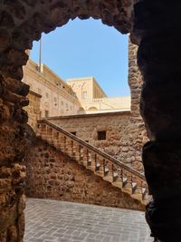 Low angle view of old building against sky