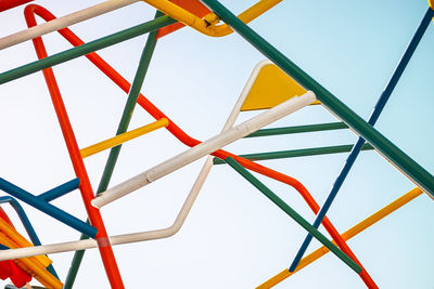 Low angle view of metallic structure against sky