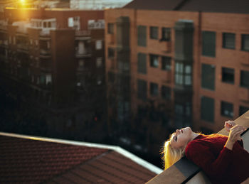 Portrait of a beautiful blonde woman in an urban background.