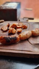 High angle view of bread on cutting board