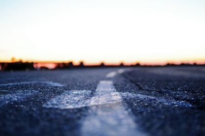 Surface level of road at sunset