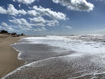 Scenic view of beach against sky