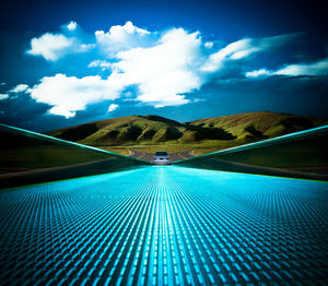 Scenic view of swimming pool against sky