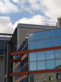 Low angle view of modern building against sky