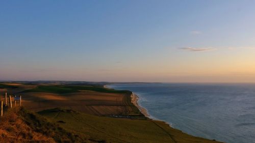 Scenic view of sea against sky during sunset