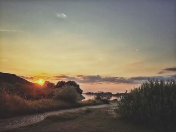 Scenic view of sunset over landscape