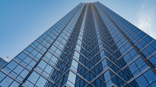 Low angle view of skyscraper against clear sky