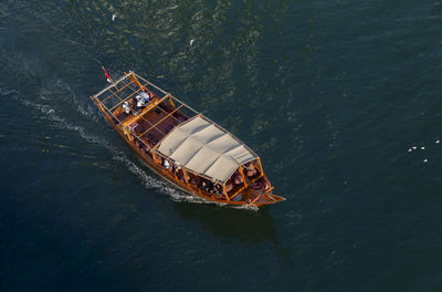 High angle view of boat sailing on sea