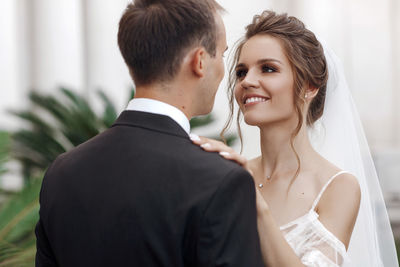 Smiling couple holding hands