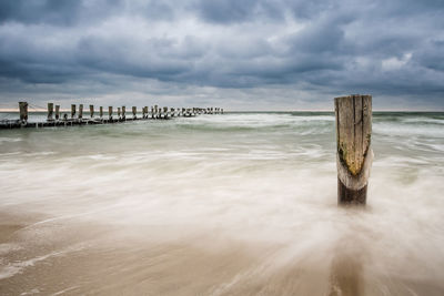 Scenic view of beach against sky