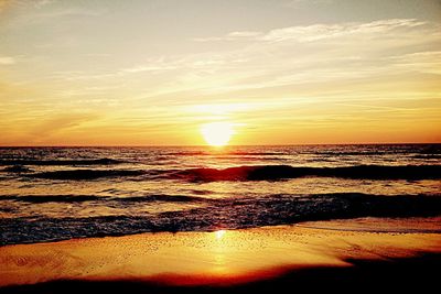 Scenic view of sea at sunset