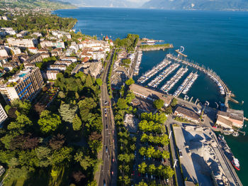 High angle view of buildings by sea