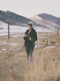 Woman in winter landscape