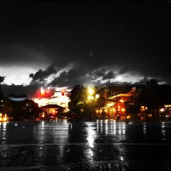 Illuminated street light at night