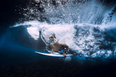 Man surfing in sea