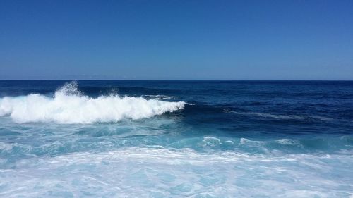 Scenic view of sea against clear sky