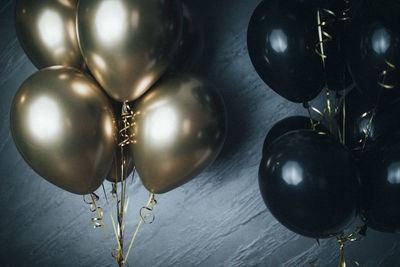 High angle view of balloons hanging on metal