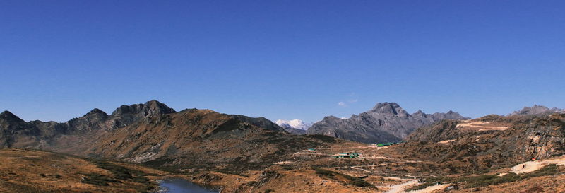 Scenic alpine landscape with mountain zigzag road