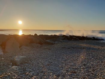 Scenic view of sea against sky during sunset