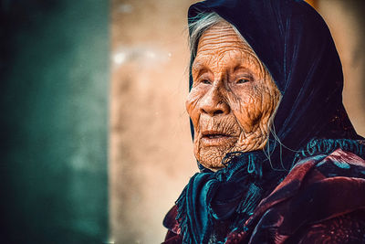 Close-up of senior woman looking away