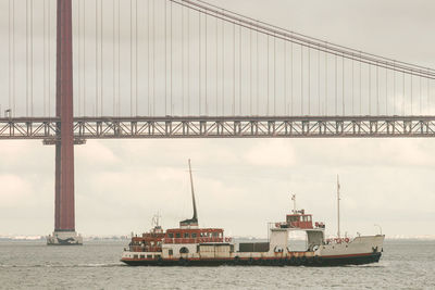 View of bridge over sea against sky