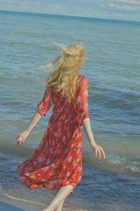 Full length of woman on beach