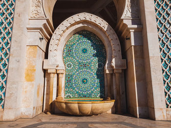 Water trap and arches at hassan ii mosque in casablanca, morocco 