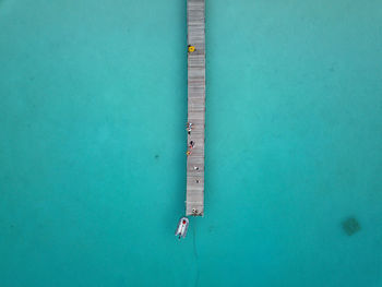 High angle view of people swimming in pool