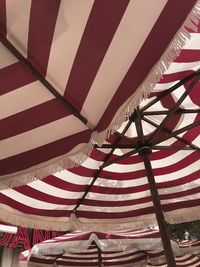 Low angle view of flags hanging from ceiling