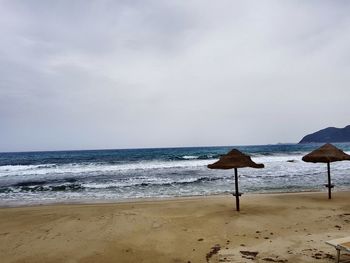 Scenic view of beach against sky