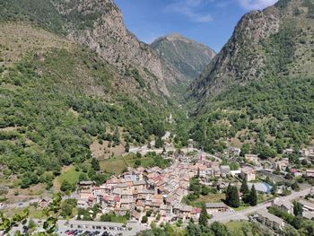 Aerial view of townscape and mountains